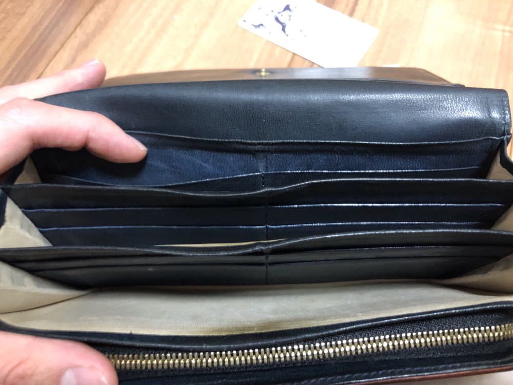ウォームスクラフツマニュファクチャー 長財布 ネイビー 中古 ホース