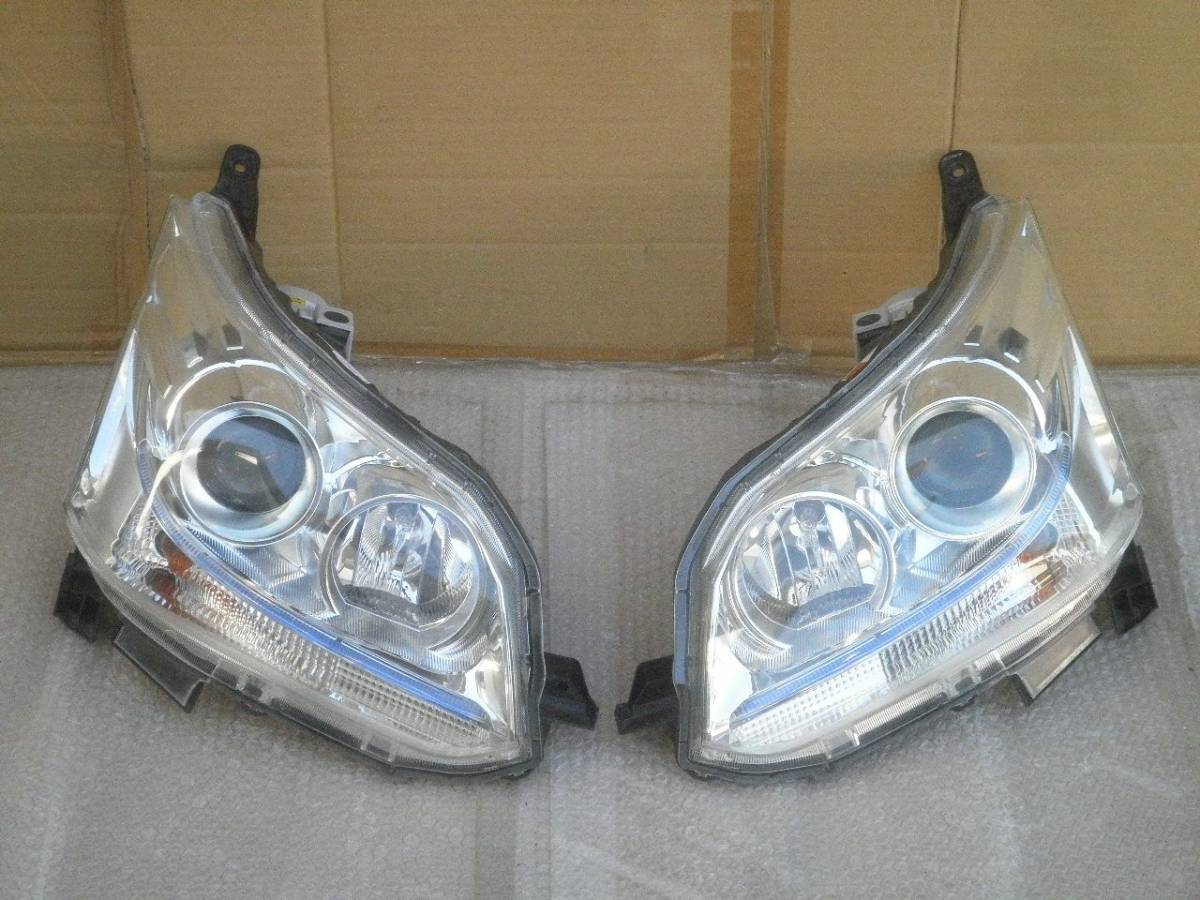 ムーヴカスタム LA100S ヘッドライト左右 ダイハツ ムーヴカスタム LA100S 純正HIDヘッドライト 左右 ASSY 110