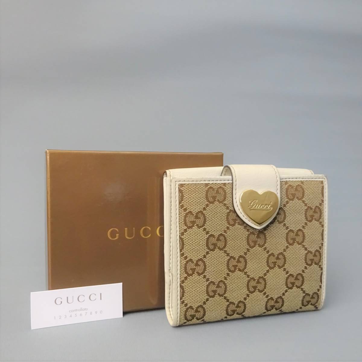 美品 グッチ 長財布 GGキャンバス ラブリーハート ボタン式 ゴールド 白系 GUCCI GGキャンバス 長財布 ラブリーハート グッチ 可愛さは、内側に
