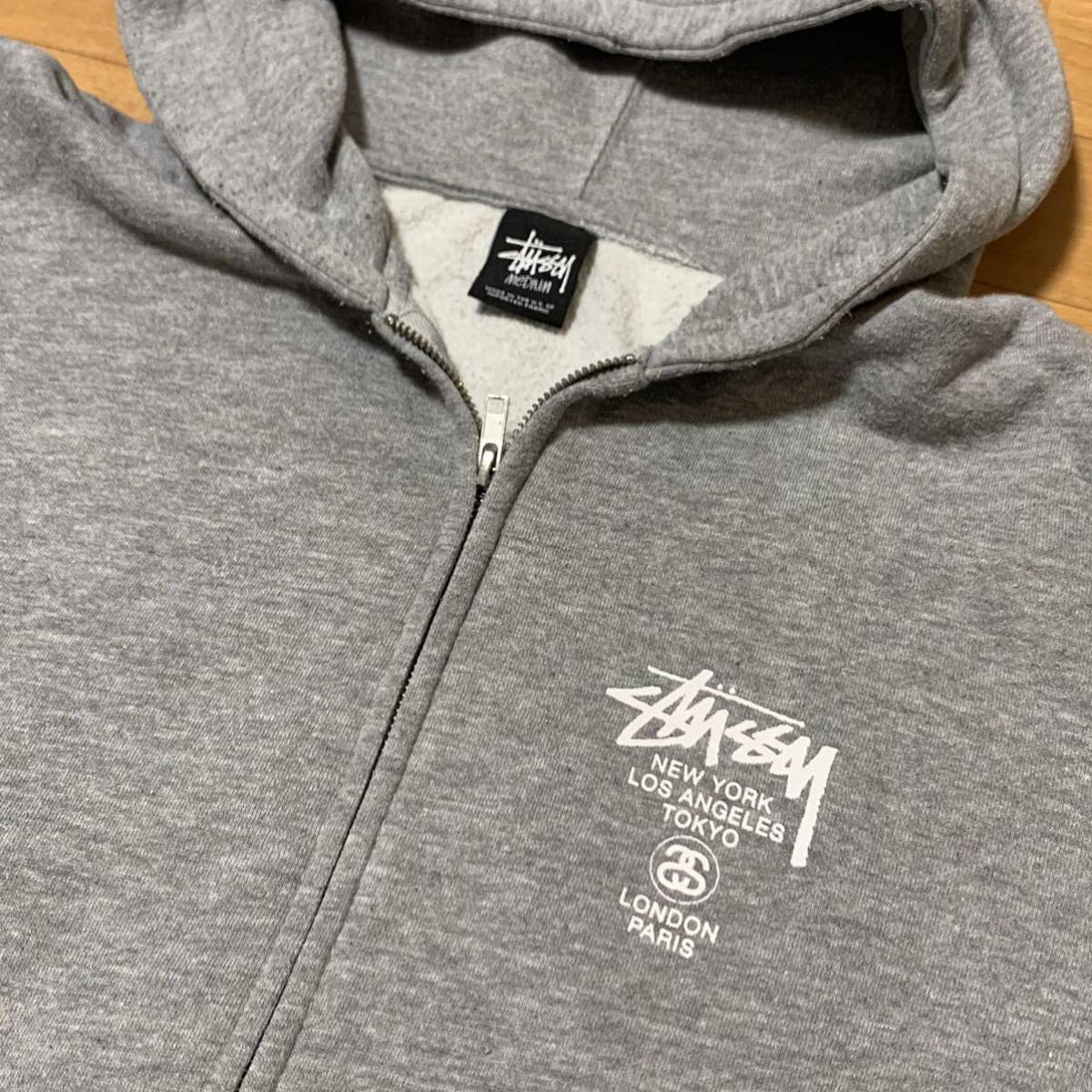 STUSSY ワールドツアー ジップアップ パーカー グレーM（スウェット t 
