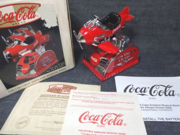  レア コカコーラ メカニカルバンク 飛行機 金属製貯金箱(コカ・コーラ)｜売買されたオークション情報、yahooの商品情報をアーカイブ公開 - オークファン コカ・コーラ