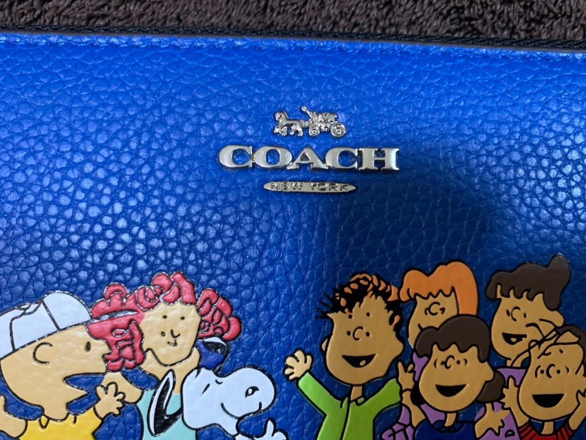 コーチ スヌーピー 長財布 COACH | ピーナッツコラボ 財布スヌーピーコラボブルー水色ストラップ付き COACHコーチ長 COACHコーチ長財布 &frasl; ラウンドファスナー長財布 スヌーピーパッチワーク francore 新品新品COACH コーチ長財布 高級牛革製長財布