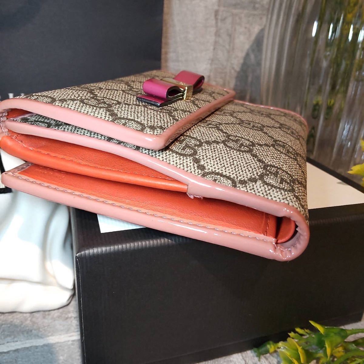 GUCCI 折り財布 ピンクとオレンジ