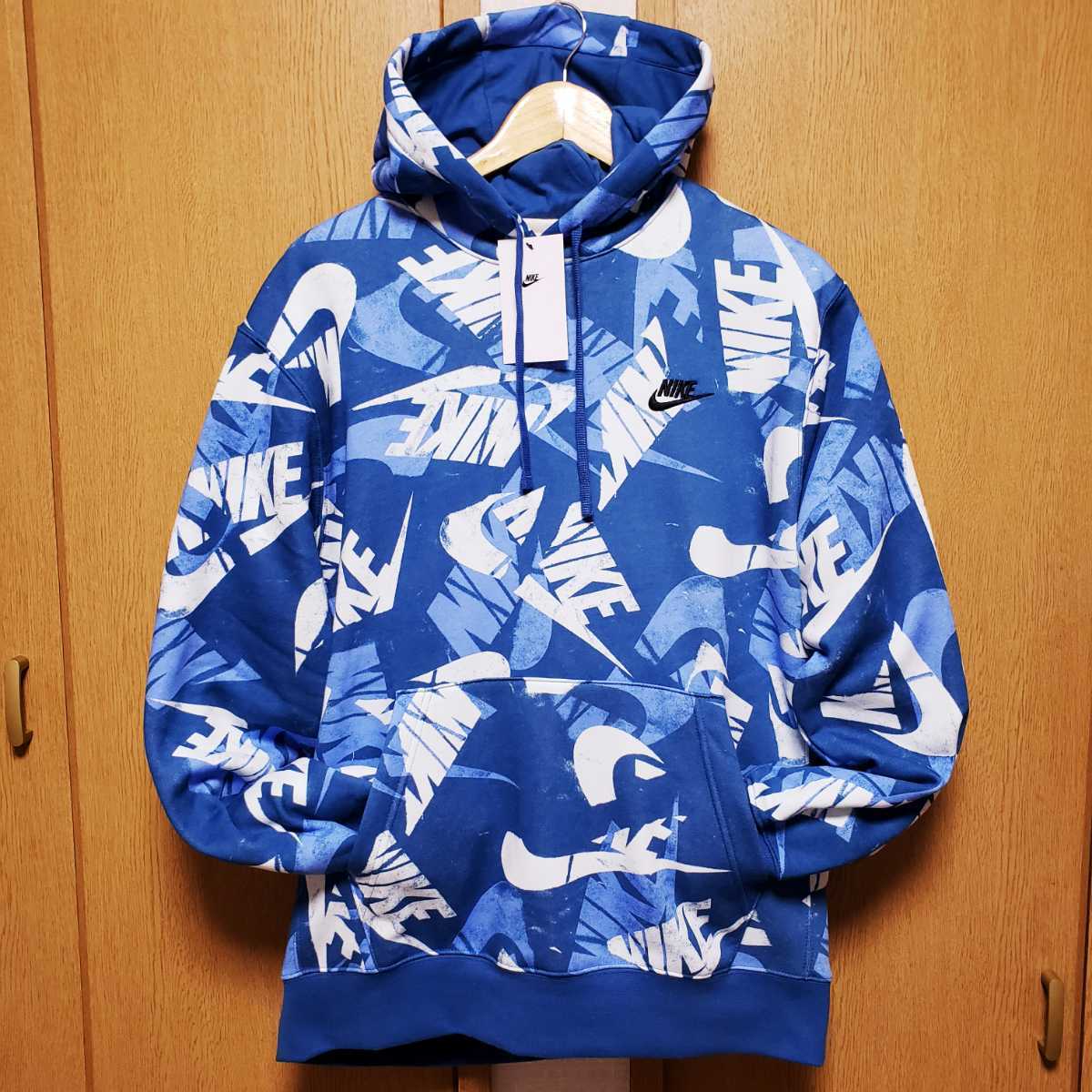 新品】NIKE 総柄 パーカー XLサイズ ブルー 裏起毛 全面プリント プル 