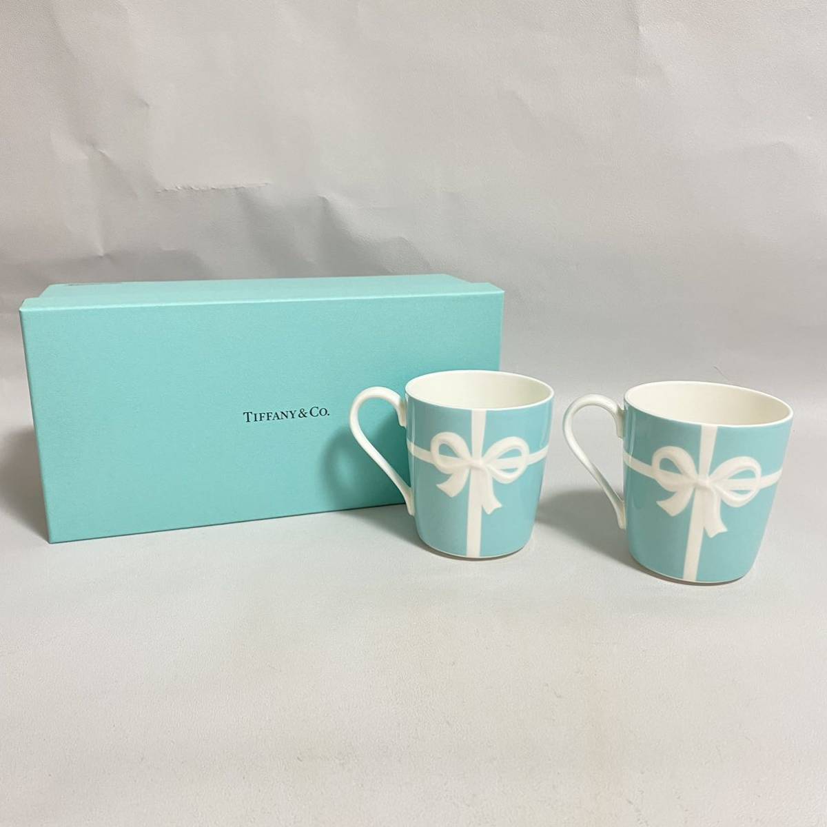 爆買い，新作 TIFFANY&Co. ティファニー ブルーボウ マグカップ ペア2客セット 箱付 ブルーリボン ブルーボックス BPX(ティファニー)｜売買されたオークション情報、yahooの商品情報をアーカイブ公開 - オー ティファニー