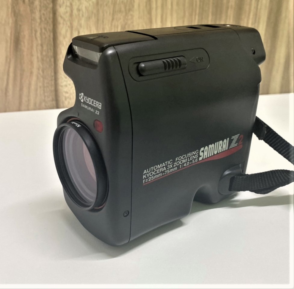 mz-5N_with_28-70mm_f4_front_view