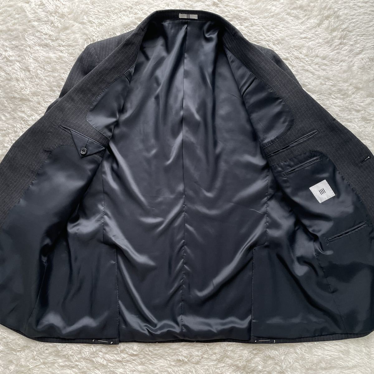 未使用SUIT SELECT スーツセレクト【紳士の佇まい】BB6 Lサイズ相当 スーツセットアップ グレー ストライプ 総裏 3B 段返り ウール SELECT SUIT スーツセレクト SELECTION｜6WAYスーツ｜スーツセレクト｜ショップ SELECT◇スーツ&frasl;Y6&frasl;ウール&frasl;GRY&frasl;ストライプ&frasl;BLK1707 WEB限定&frasl;OUTLET発送在庫ありRBC年間ノーカラー1釦