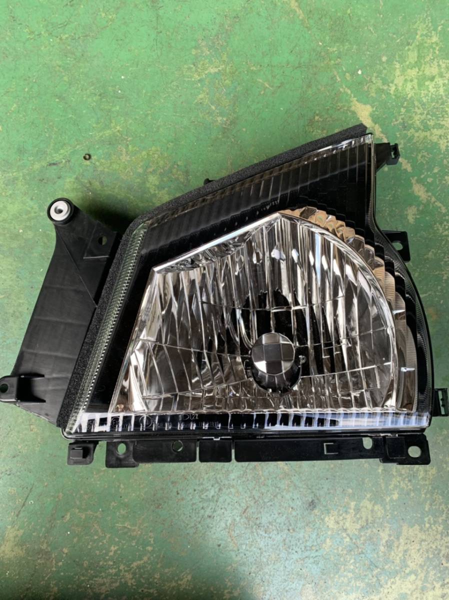 新品　いすゞ　エルフ　PB-NKR81A　純正　左　ヘッドライト　レベライザー付　KOITO　110-21819