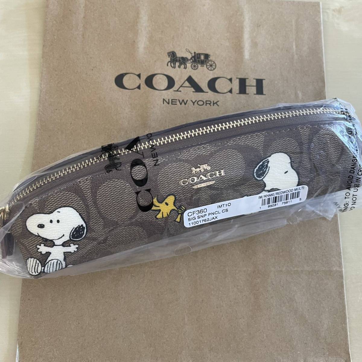 COACH × PEANUTS 新品 ペンシルケース シグネチャー スヌーピー ウッド 