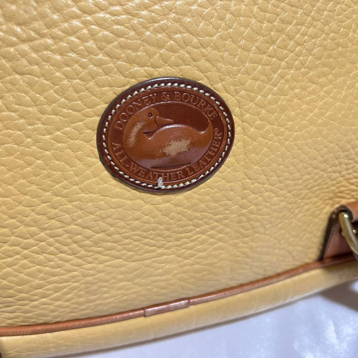 DOONEY&BOURKE リュック 巾着型 イエロー チャーム付き ドゥーニー 