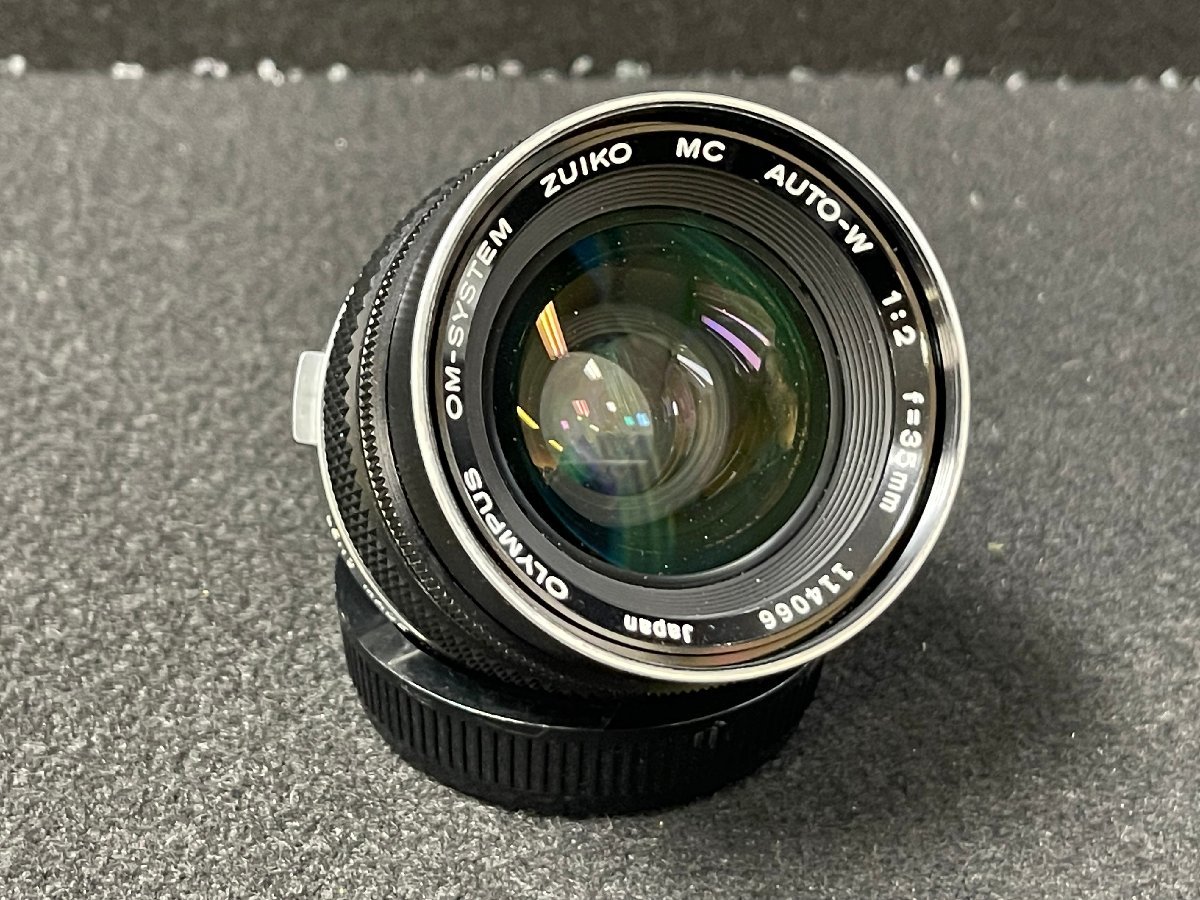 Olympus OM-SYSTEM Zuiko MC Auto-W 35mm f/2 is a rather fast lens for a wide angle and while it doesn't have the best reputation compared to the other f/ 2 Zuikos, this is