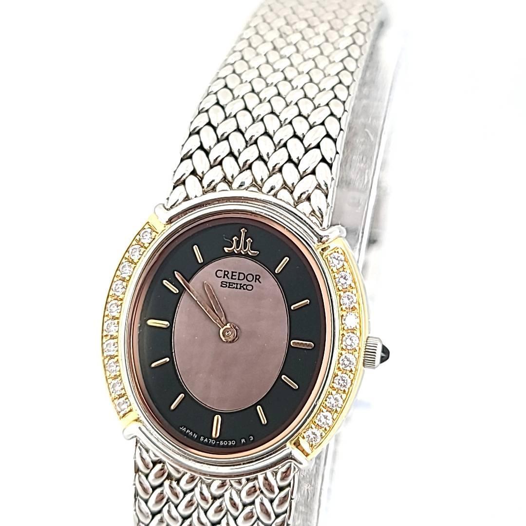 ☆【美品稼働品】セイコー SEIKO QZ クレドール 18KT×SS ピンクシェル文字盤 オーバル ダイヤベゼル レディース腕時計 5A70-3000