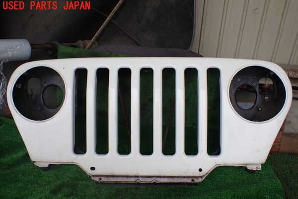 1UPJ-93911050]ジープラングラー(TJ40S)ラジエターグリル 中古