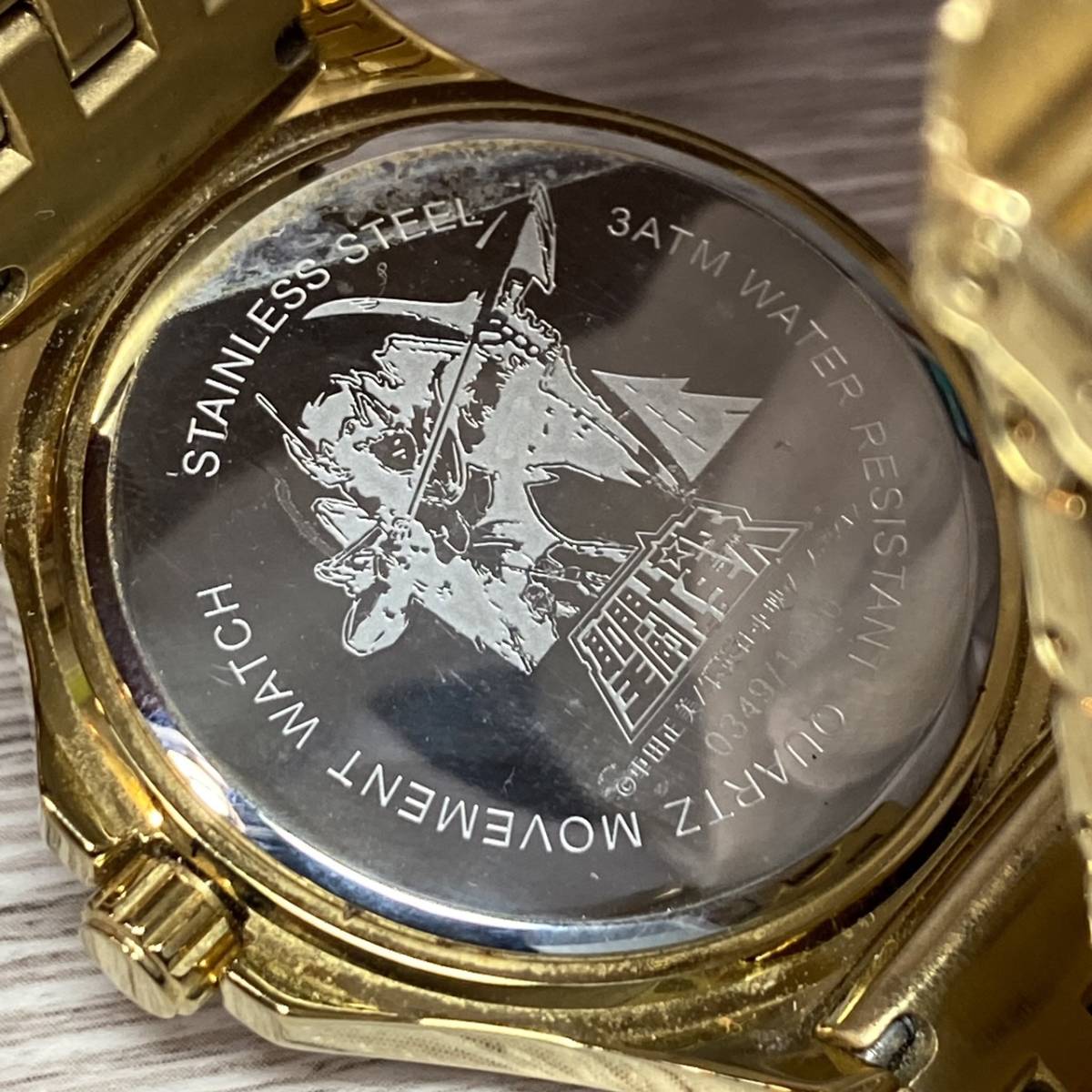 ●【YH-7439】中古品 聖闘士星矢 黄金の聖域 映画記念ウォッチ クォーツ 腕時計 ゴールド 限定品 電池切れ 現状不動品【レタパプラス可】
