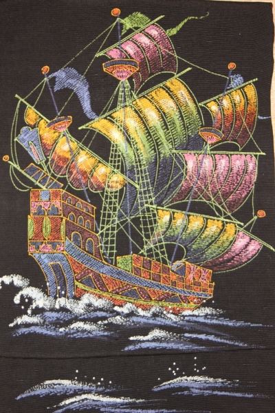 黒の紬に帆船の名古屋帯