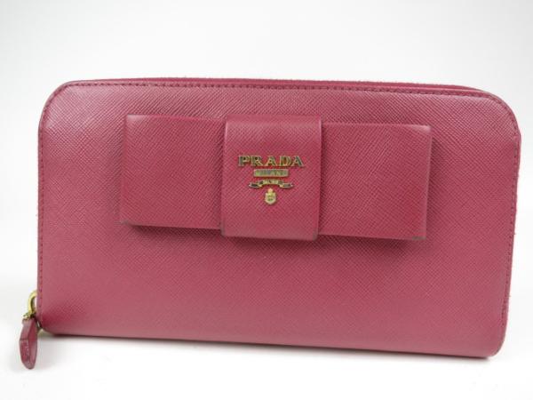 50908☆1円本物プラダ☆ラウンド長財布☆リボン☆サフィアーノ PRADA