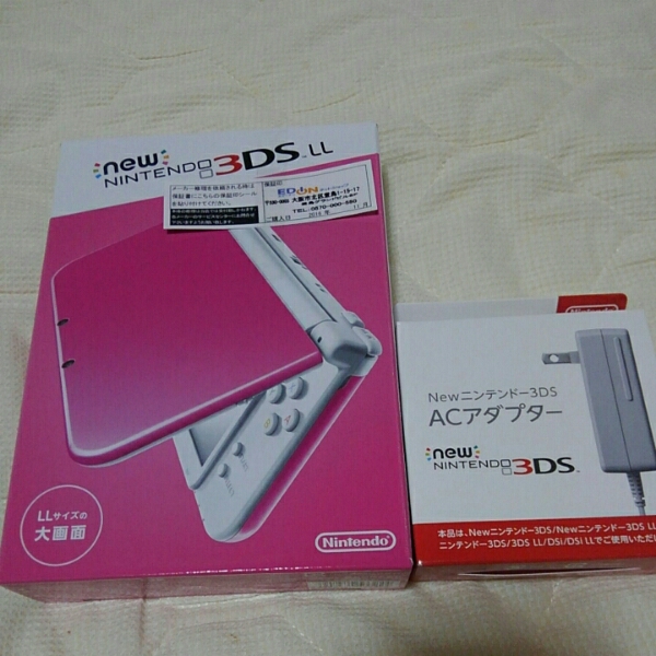 新品「任天堂New 3DS LLピンク. 」＋「アダプター」です