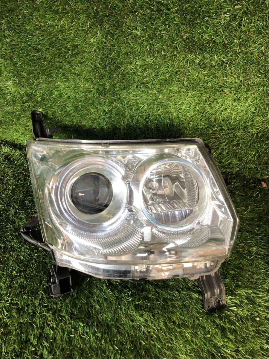 L175S☆ムーヴカスタム☆前期☆HID右ヘッドライト☆中古② ダイハツ用