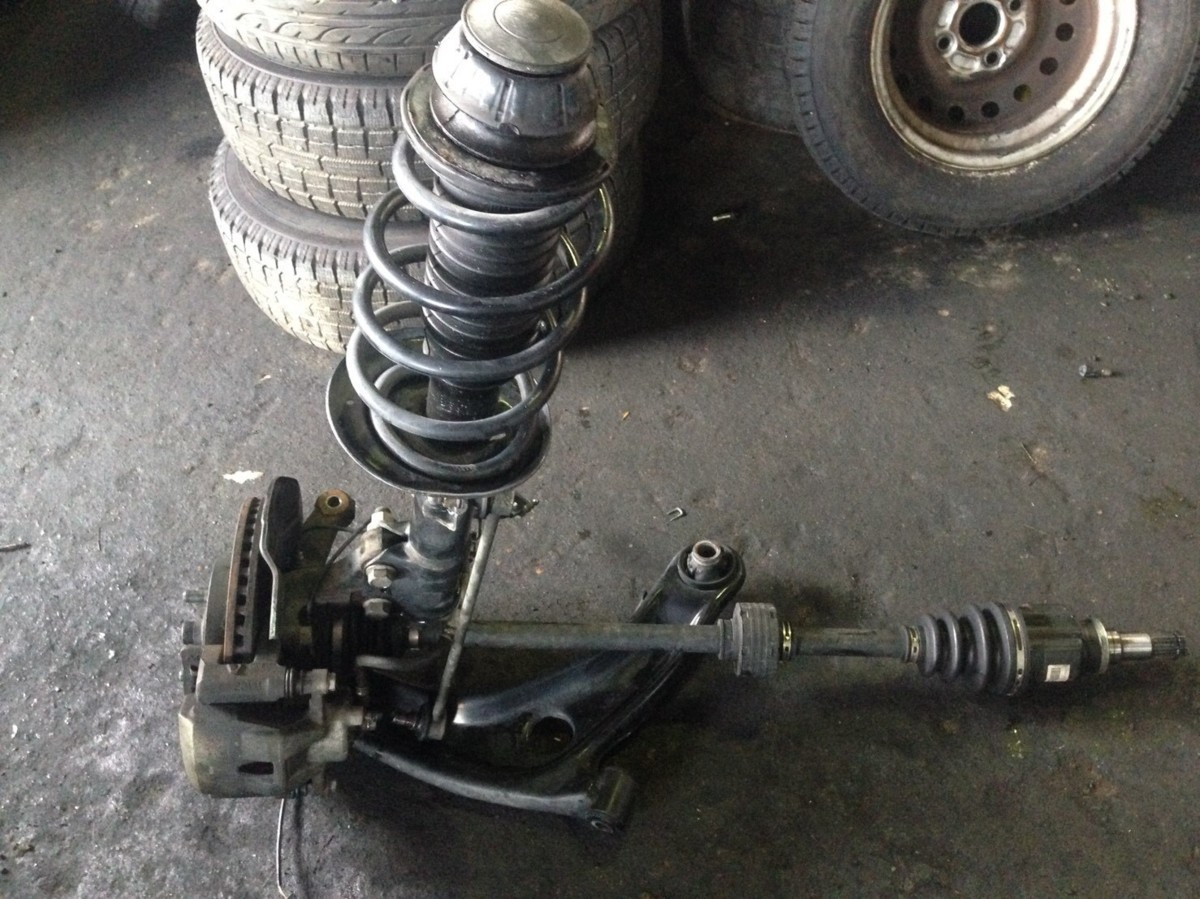 48520-52560 アクア 左フロントストラット DAA-NHP10 NHP10 G 左F 082 
