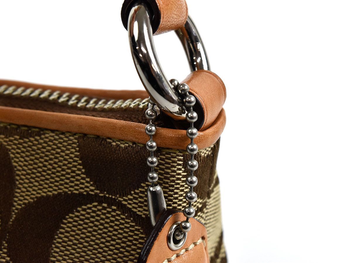 119083〇 COACH コーチ シグネチャー アクセサリーポーチ ハンドバッグ 