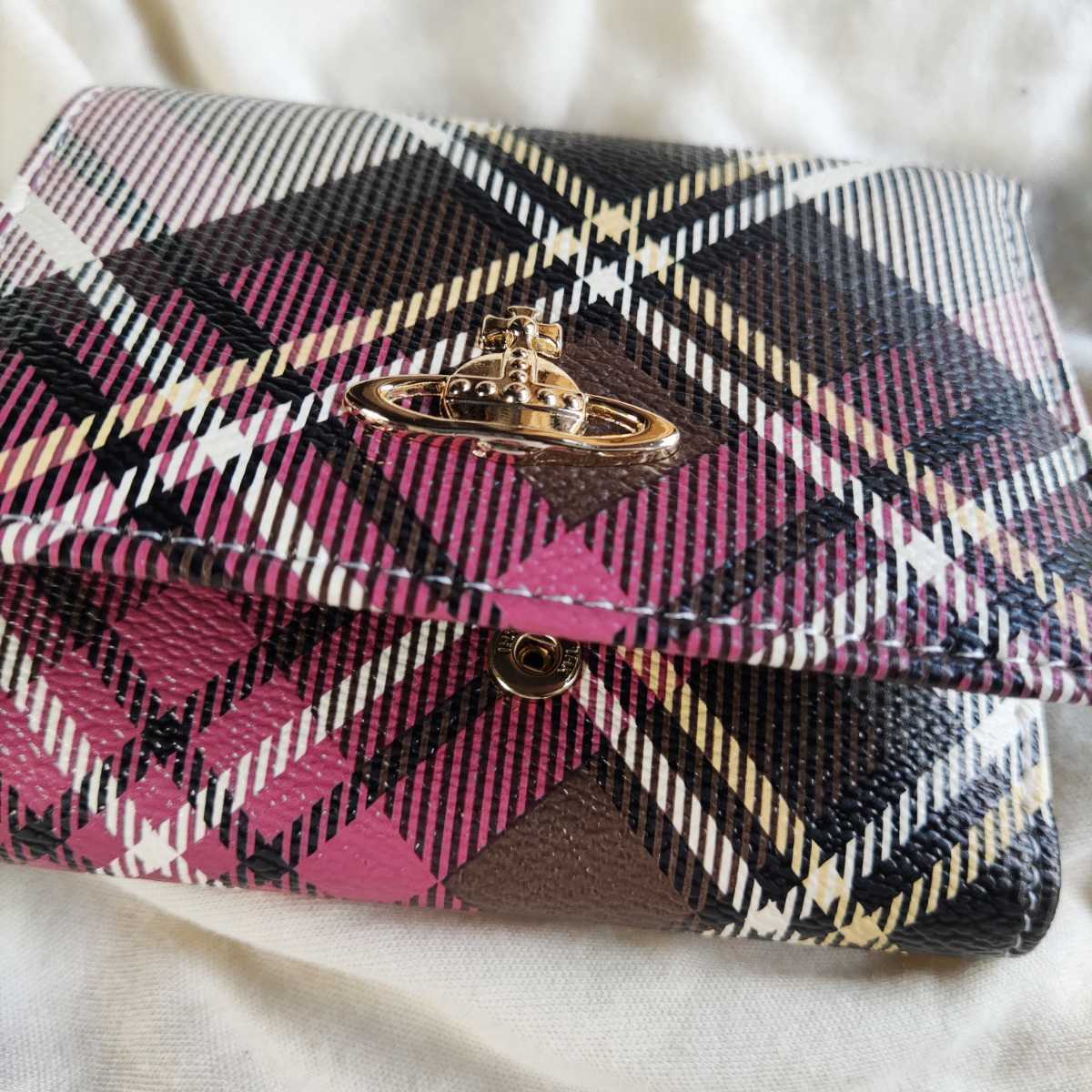 【新品・未使用】 ヴィヴィアンウエストウッド Vivienne Westwood 三つ折り財布 がま口 チェック　レディース Vivienne Westwood ヴィヴィアン ANTHRACITE Westwoodってどんなブランド？｜ヴィヴィアンウエストウッド Of