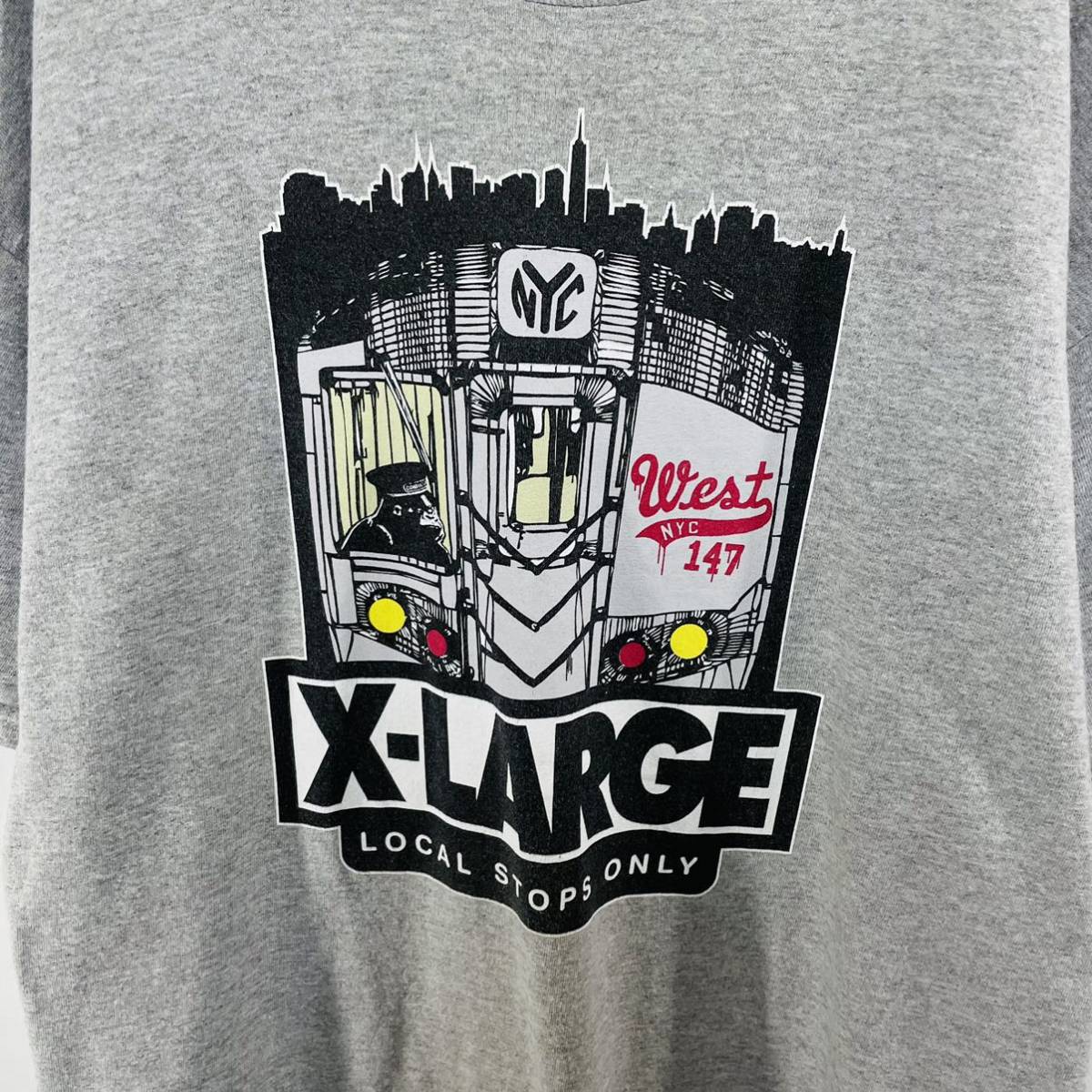 エクストララージ X-LARGE Tシャツ L フロントロゴ グレー ストリート 