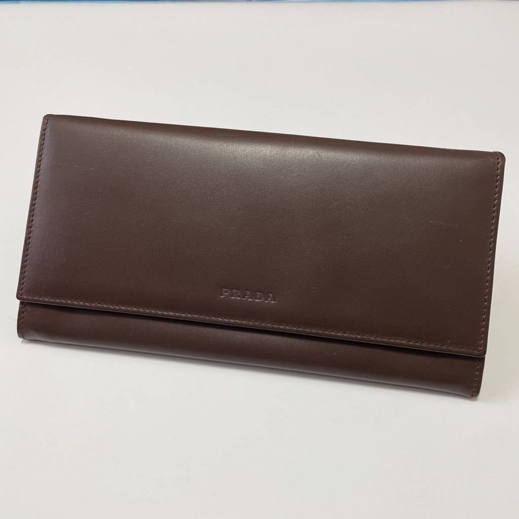  PRADA プラダ 二つ折り長財布 ブラウン 鑑定済み 本物保証(男性用財布)｜売買されたオークション情報、yahooの商品情報をアーカイブ公開 - オークファン 服飾小物