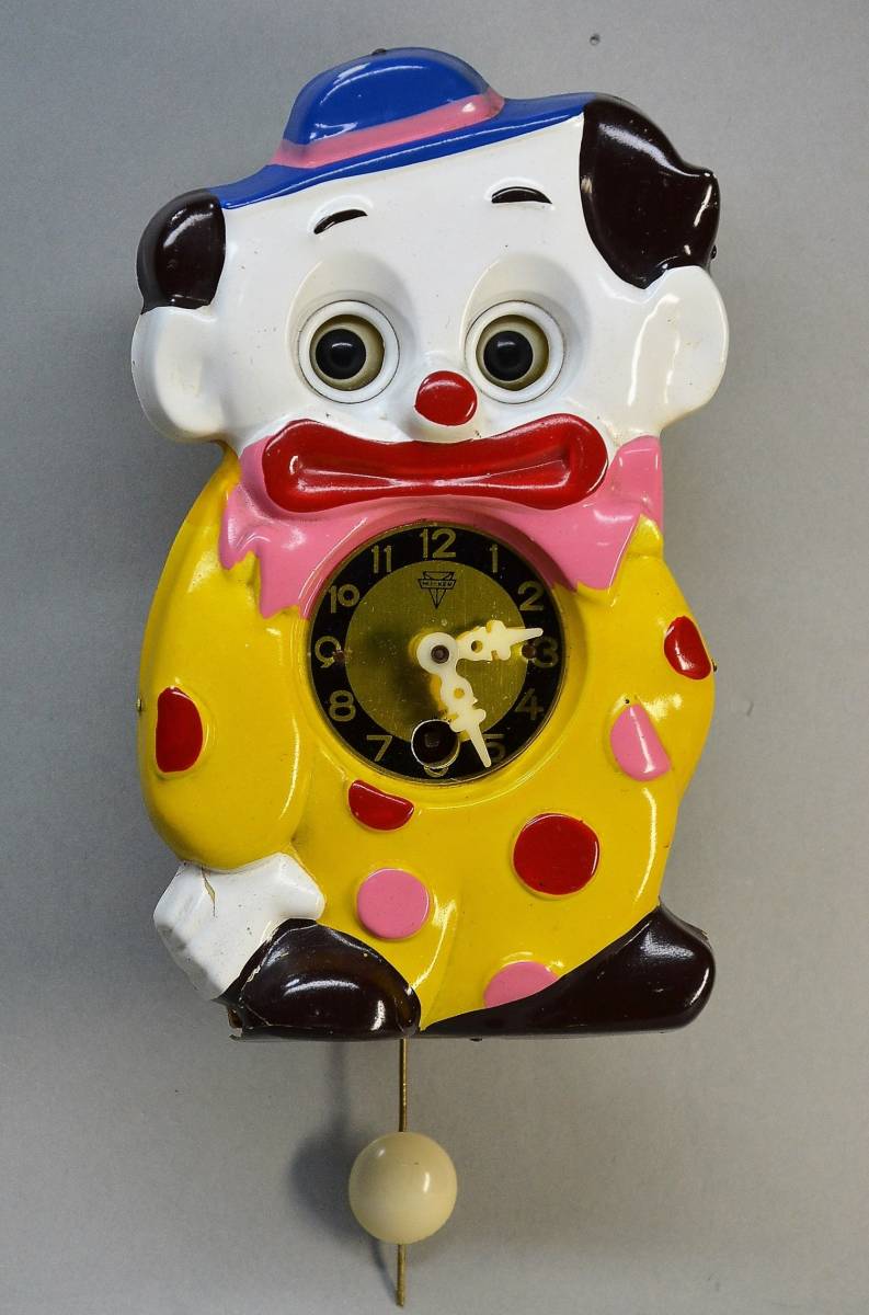 ミケン時計 が1965年頃 販売した、ピエロ の目玉が動く振り子式掛時計