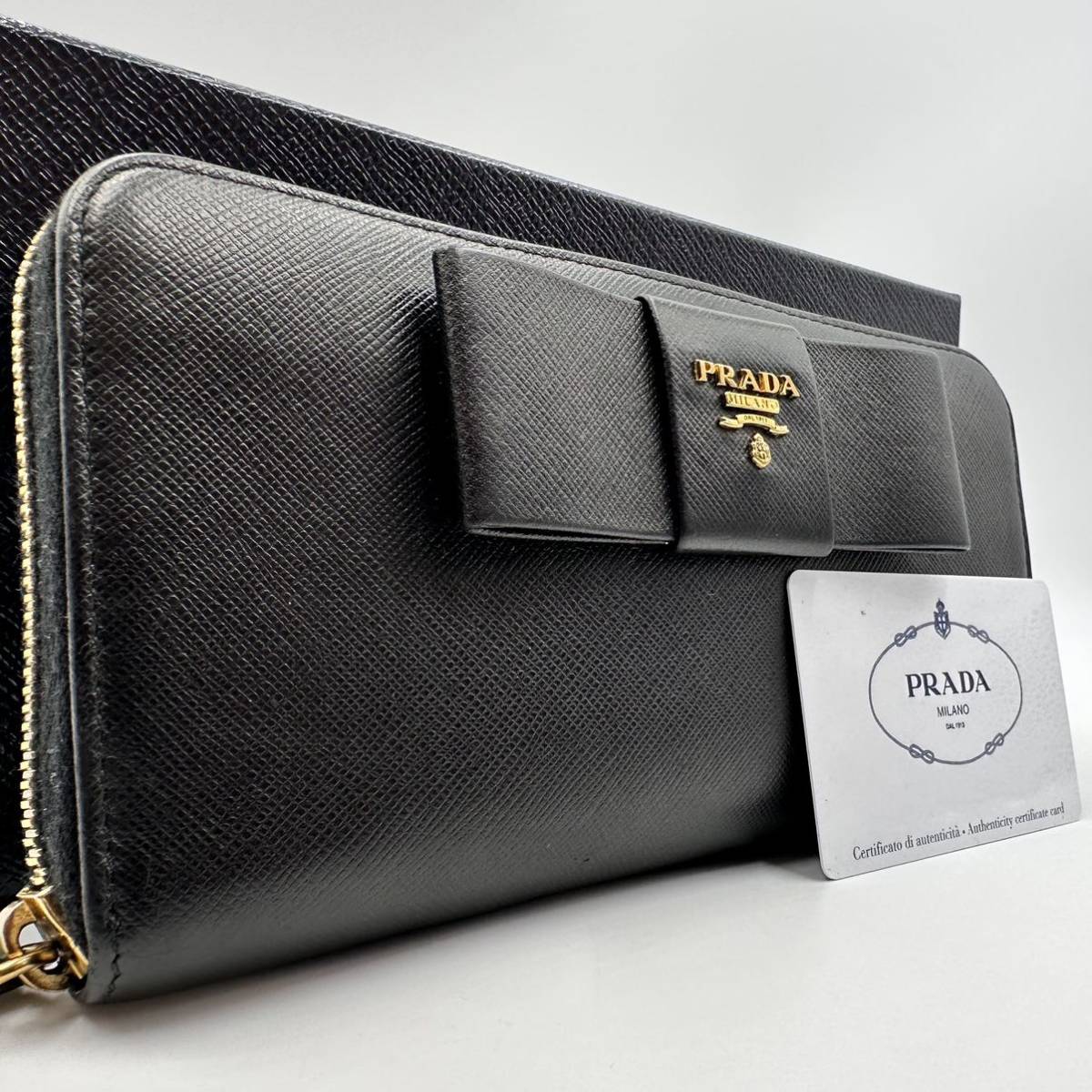 485【極美品・付属品完備】PRADA プラダ 長財布 ラウンドジップ ファスナー メタルロゴ 金具 リボン サフィアーノレザー 本革 ブラック 黒