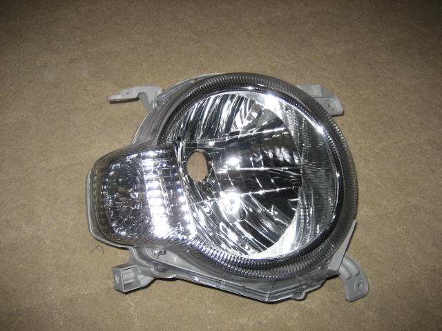 ミラココア L675S 右ヘットライト ハロゲン 中古