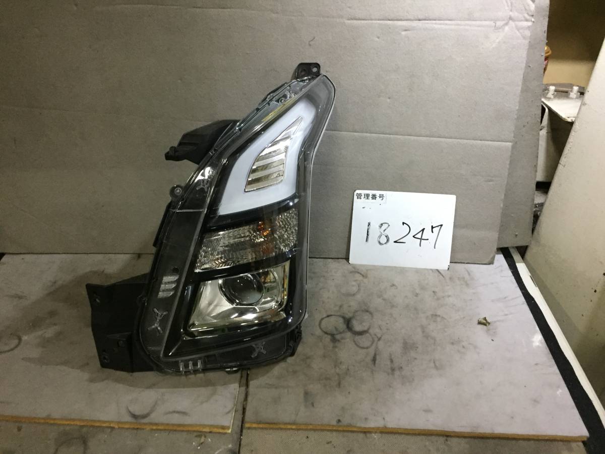 18237 スズキ MH55S ワゴンRスティングレー 左ヘッドライト 中古品 