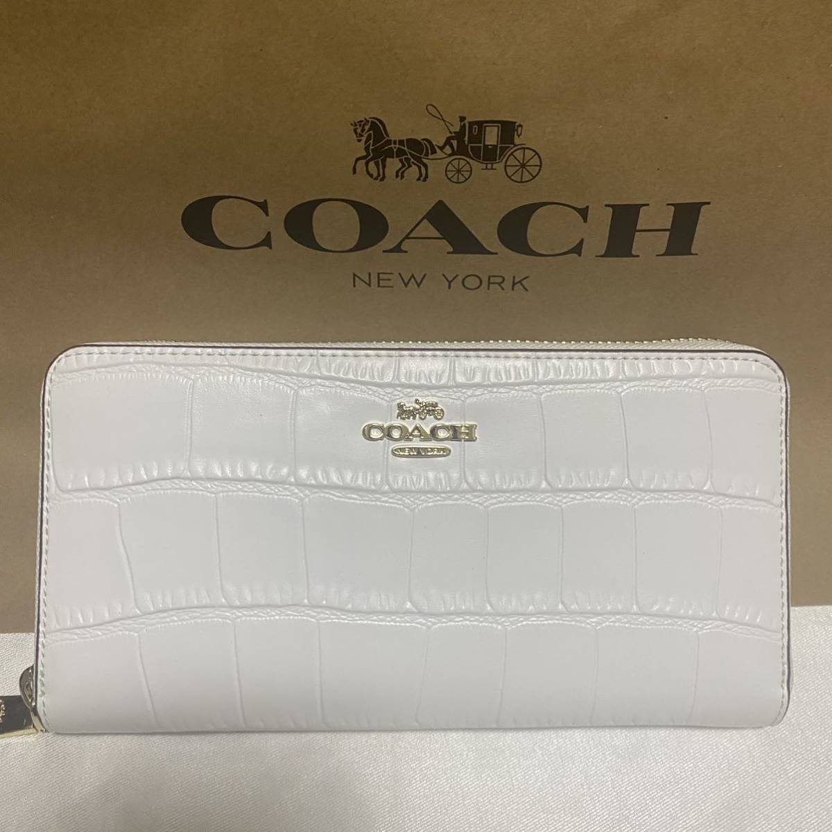新品】コーチ クロコ エンボスド シグネチャー 本革 長財布 ホワイト