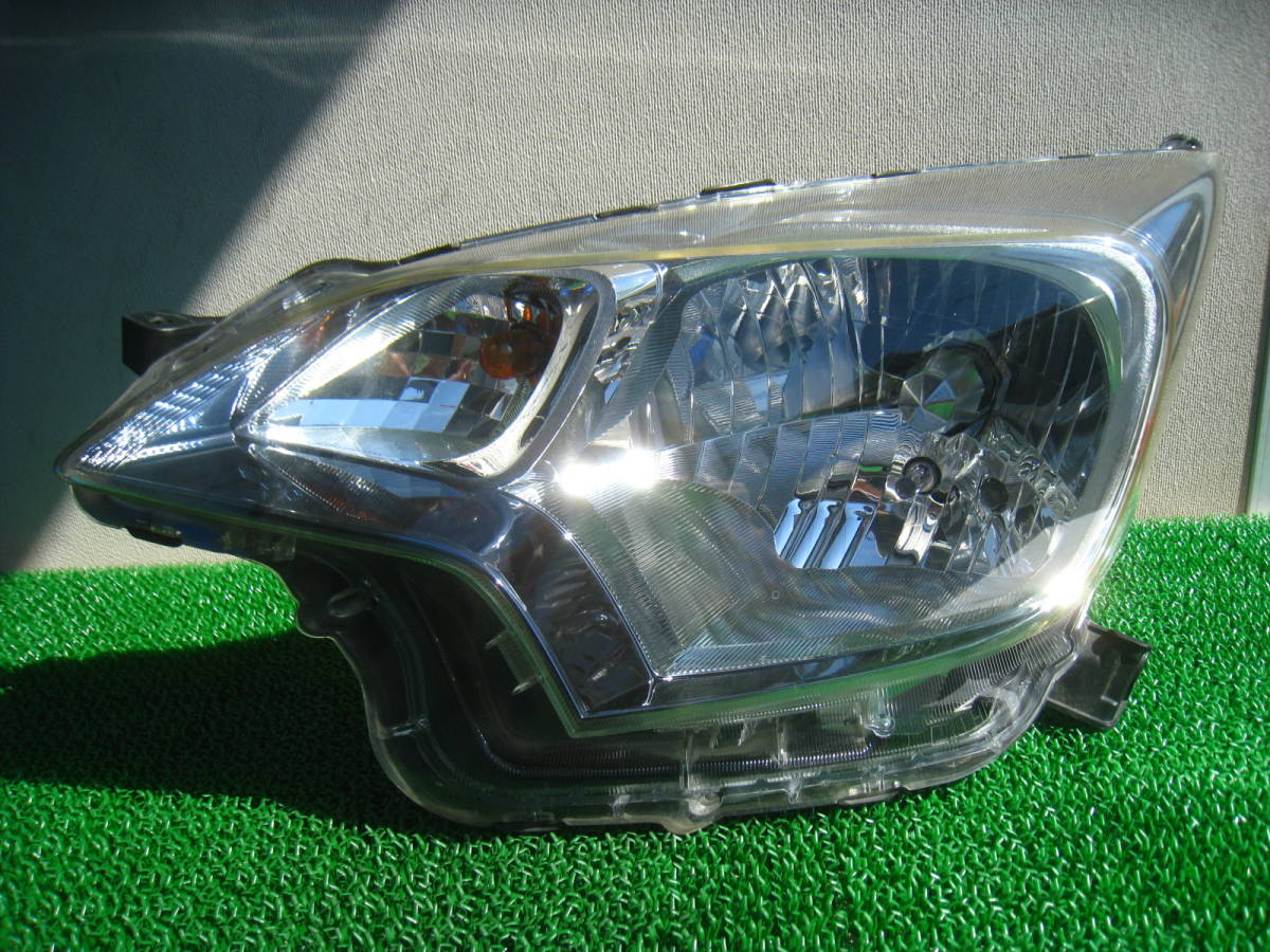 ●NCP120 ラクティス 純正 ヘッドライト 左側 HID用 ICHIKOH 52-212