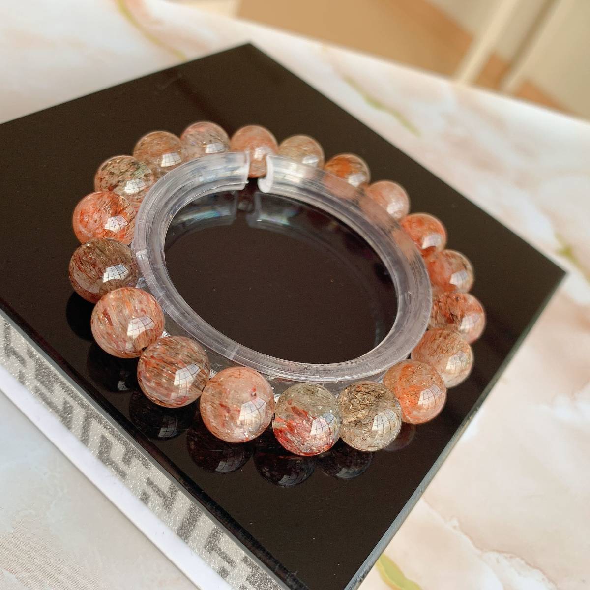 ブラックゴールドスーパーセブン☆三輪骨幹☆虹入り☆水晶☆パワーストーン☆ブレスレット☆天然石☆ラッピング袋付き☆プレゼントにも