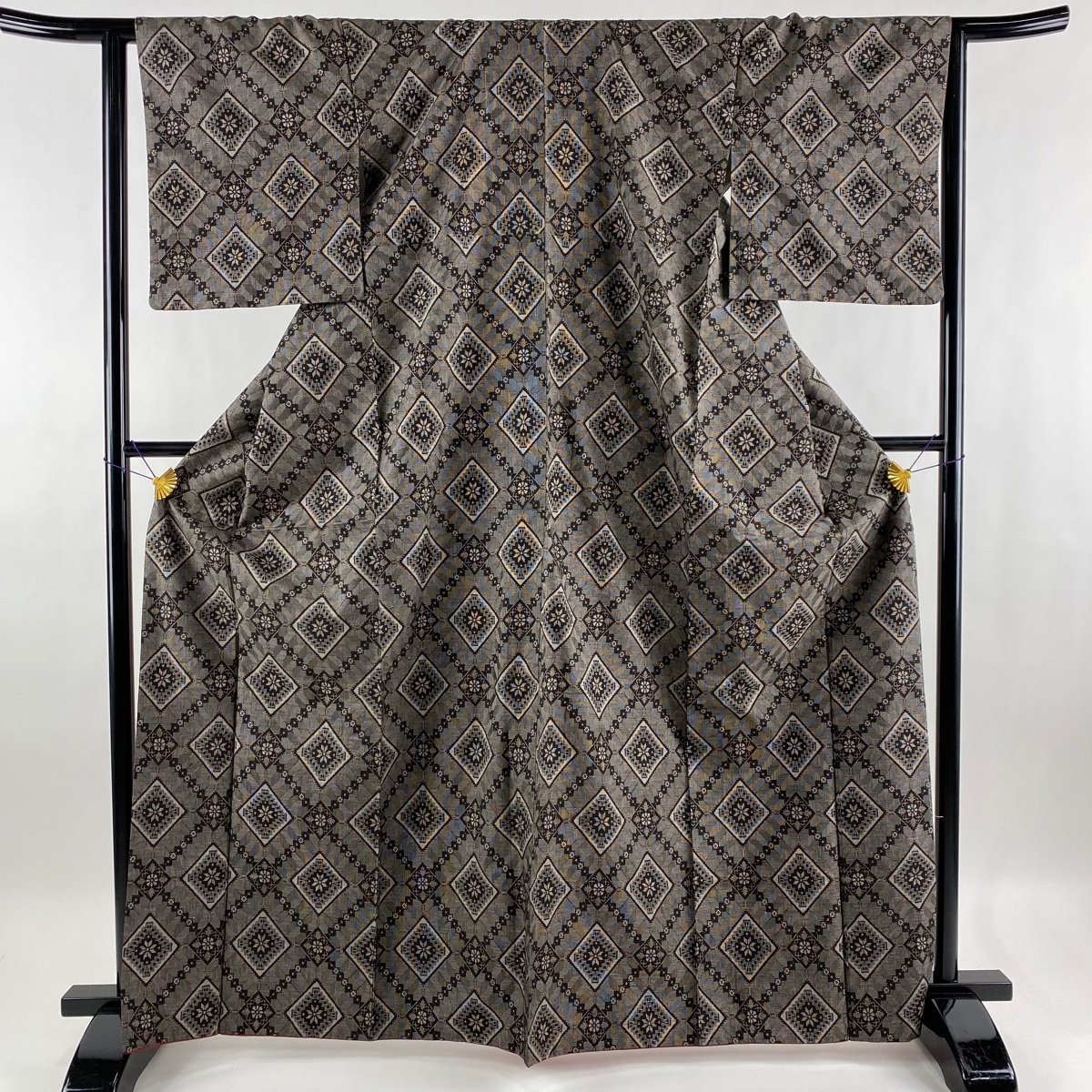 紬 美品 名品 龍郷柄 焦茶色 袷 身丈167.5cm 裄丈64cm M 正絹 【中古】