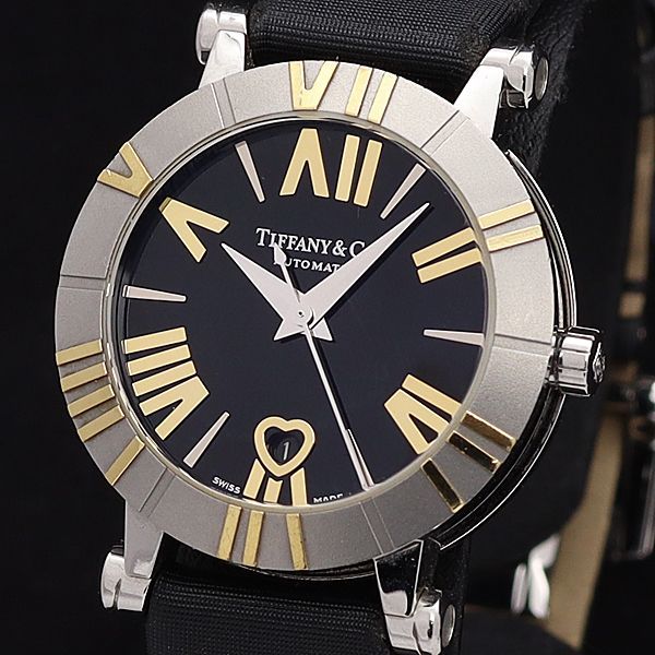 1円 稼働 良品 ティファニー AT/自動巻 アトラス 黒文字盤 デイト YG×SS 20石 裏スケ ローマン レディース腕時計 0566500KYM