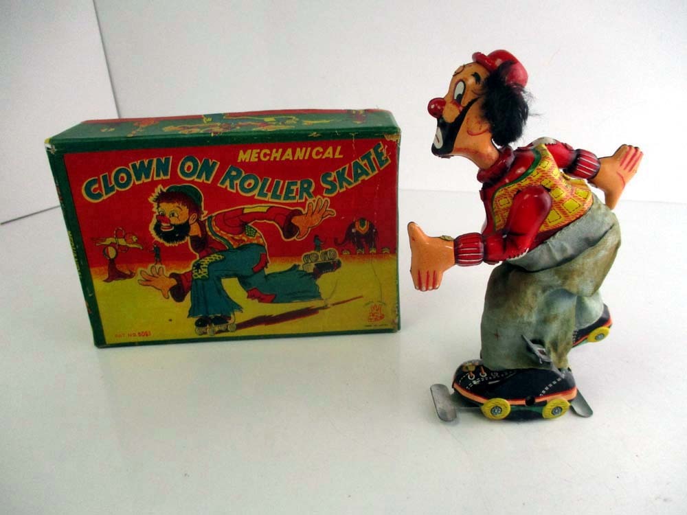 傑作 東京プレイシング商会 1950年代製 CLOWN ON ROLLER SKATE 高さ約16cm