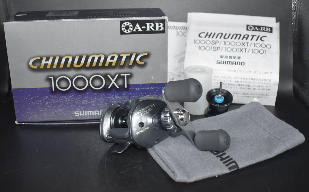 W7-16　現状品 SHIMANO CHINUMATIC 1000XT リール シマノ チヌマチック 釣り 釣具 箱付き 替えスプール1個付き 中古品 保管品