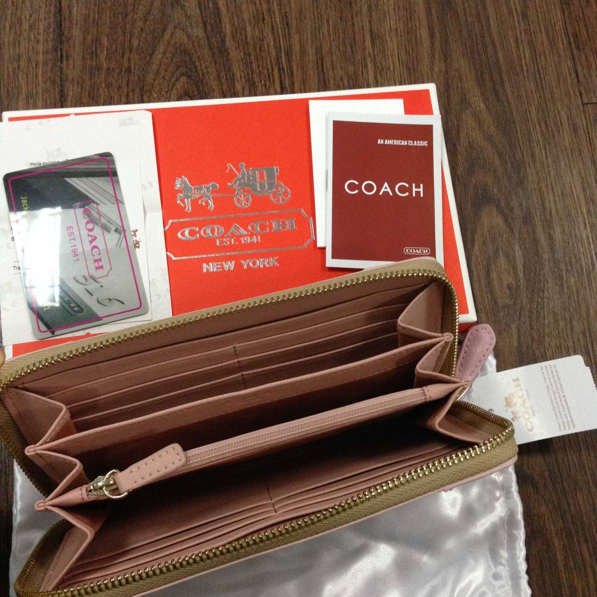 ピンク COACHコーチ 長財布 レディース
