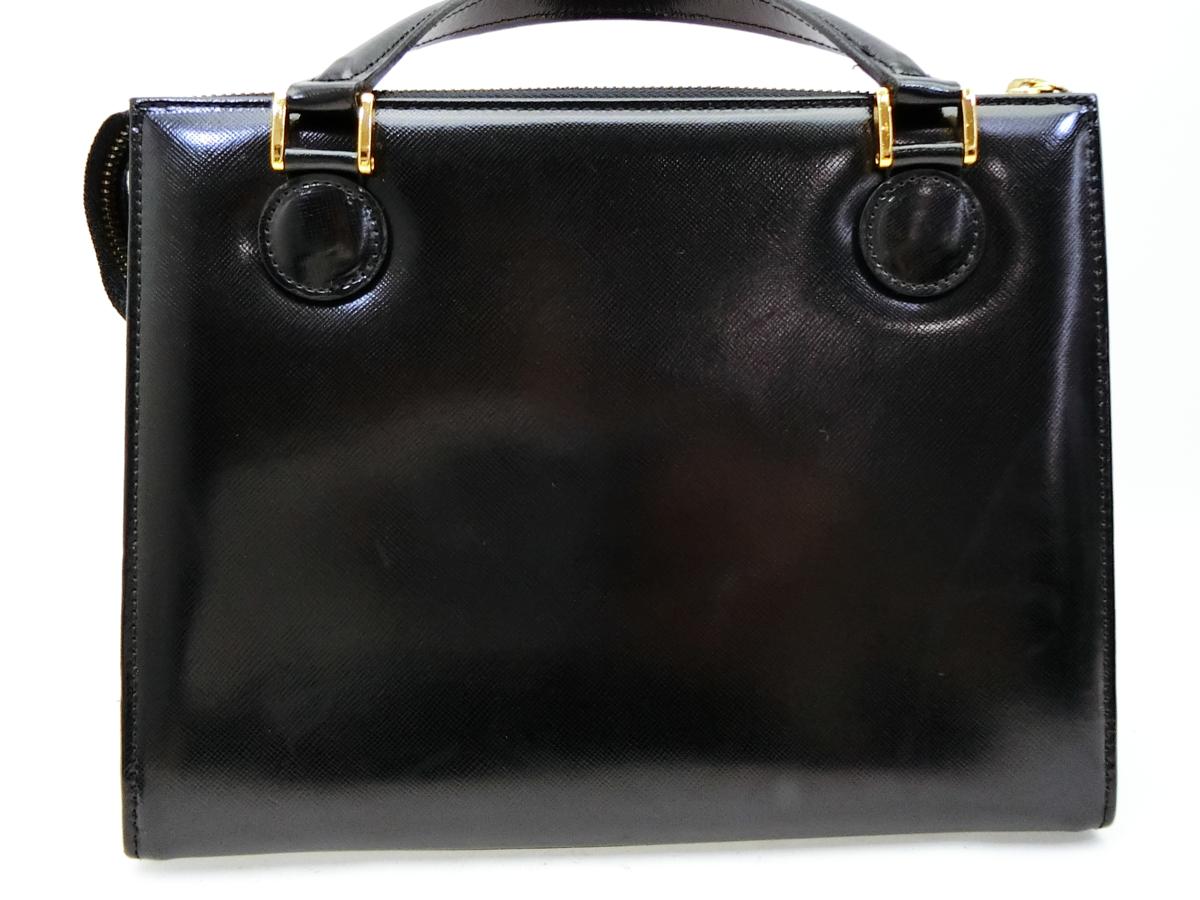 ◇S4874 VERSACE ヴェルサーチ サンバースト チャーム付 レザー 2WAY 