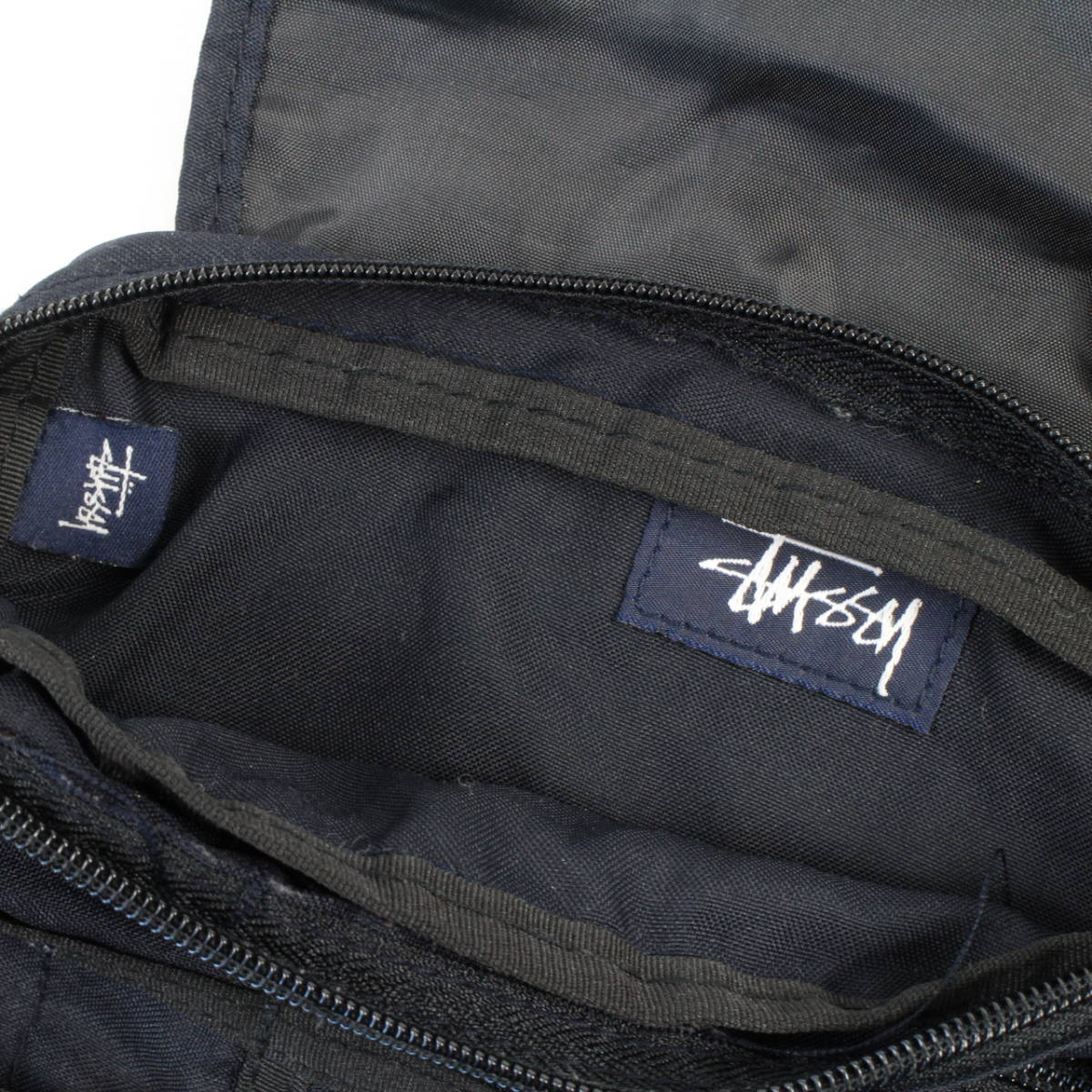 □STUSSY ステューシー ショルダーバッグ ポーチ ネイビー 【公式通販】