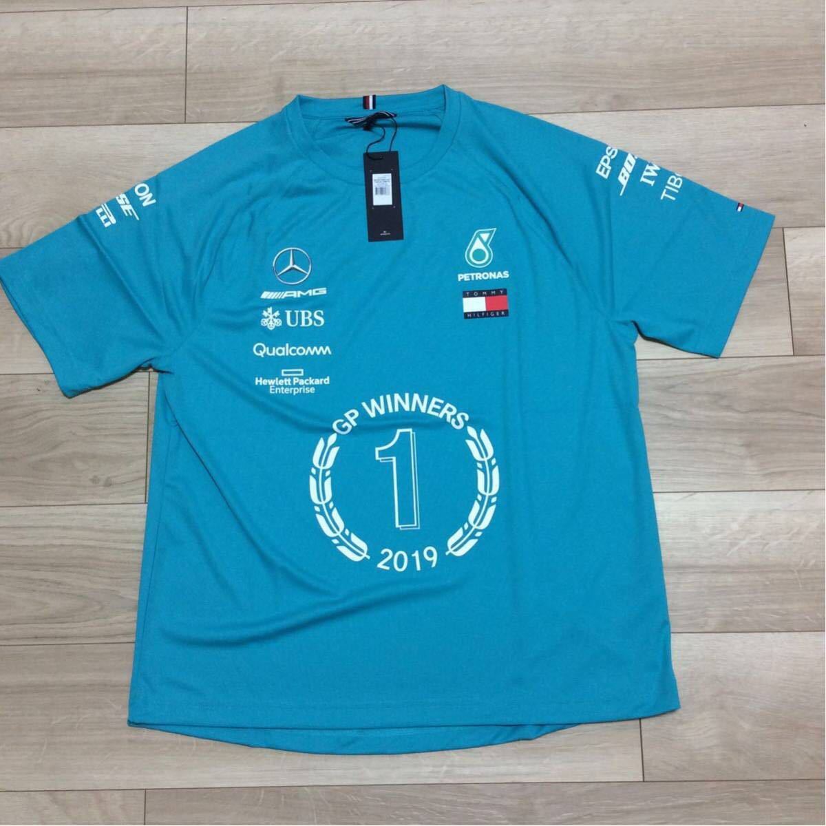 低価，人気 メルセデスAMGペトロナスF1 2019 チーム支給品 チャンピオン記念Tシャツ Lサイズ 非売品 ハミルトン ボッタス Tommy Hilfiger タグ付き(F1)｜売買されたオークション情報、yahooの商品情報をアーカイ F1