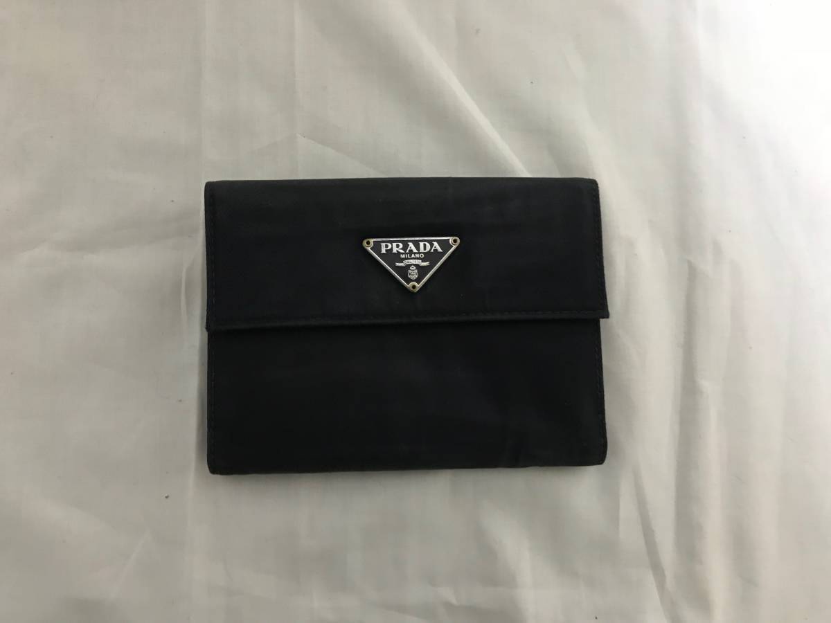 本物プラダprada本革レザーナイロン二つ折り財布サイフ紫パープル札入れメンズレディース旅行トラベル 女性用財布 売買されたオークション情報 Yahooの商品情報をアーカイブ公開 オークファン Aucfan Com