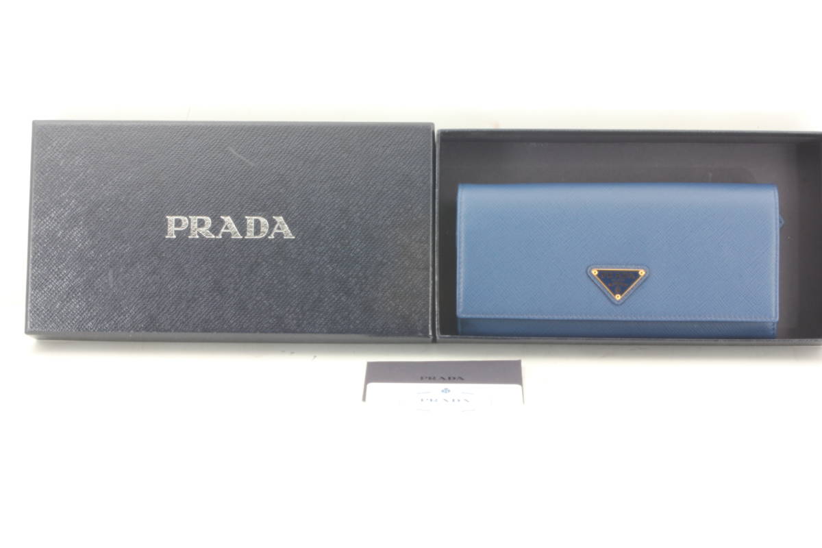 Prada プラダ 1mh132 サフィアーノ レザー パスケース付き 長財布 レディース ブルー 青 箱 ギャランティ F57 女性用財布 売買されたオークション情報 Yahooの商品情報をアーカイブ公開 オークファン Aucfan Com