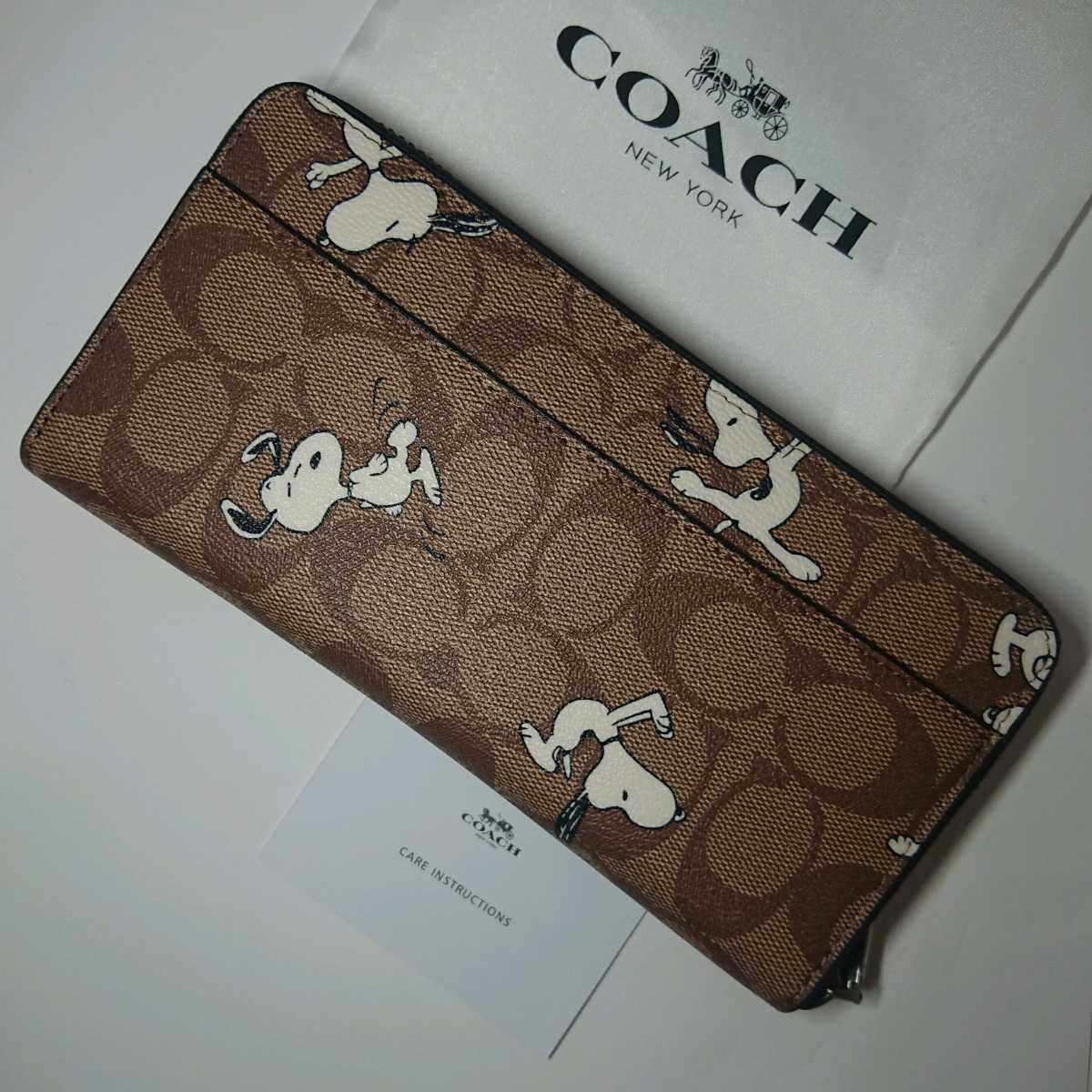 1円スタート コーチ Coach コーチ ピーナッツ Peanuts 限定コラボ スヌーピー シグネチャー 長財布 21新作 女性用財布 売買されたオークション情報 Yahooの商品情報をアーカイブ公開 オークファン Aucfan Com
