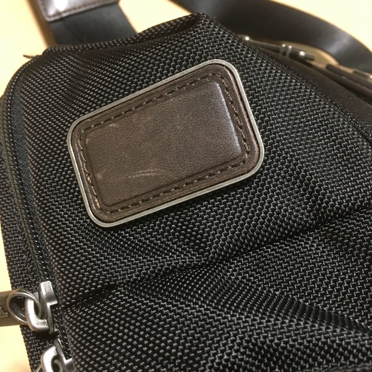 TUMI ブラック ショルダーバッグボディーバッグ 22318HKH