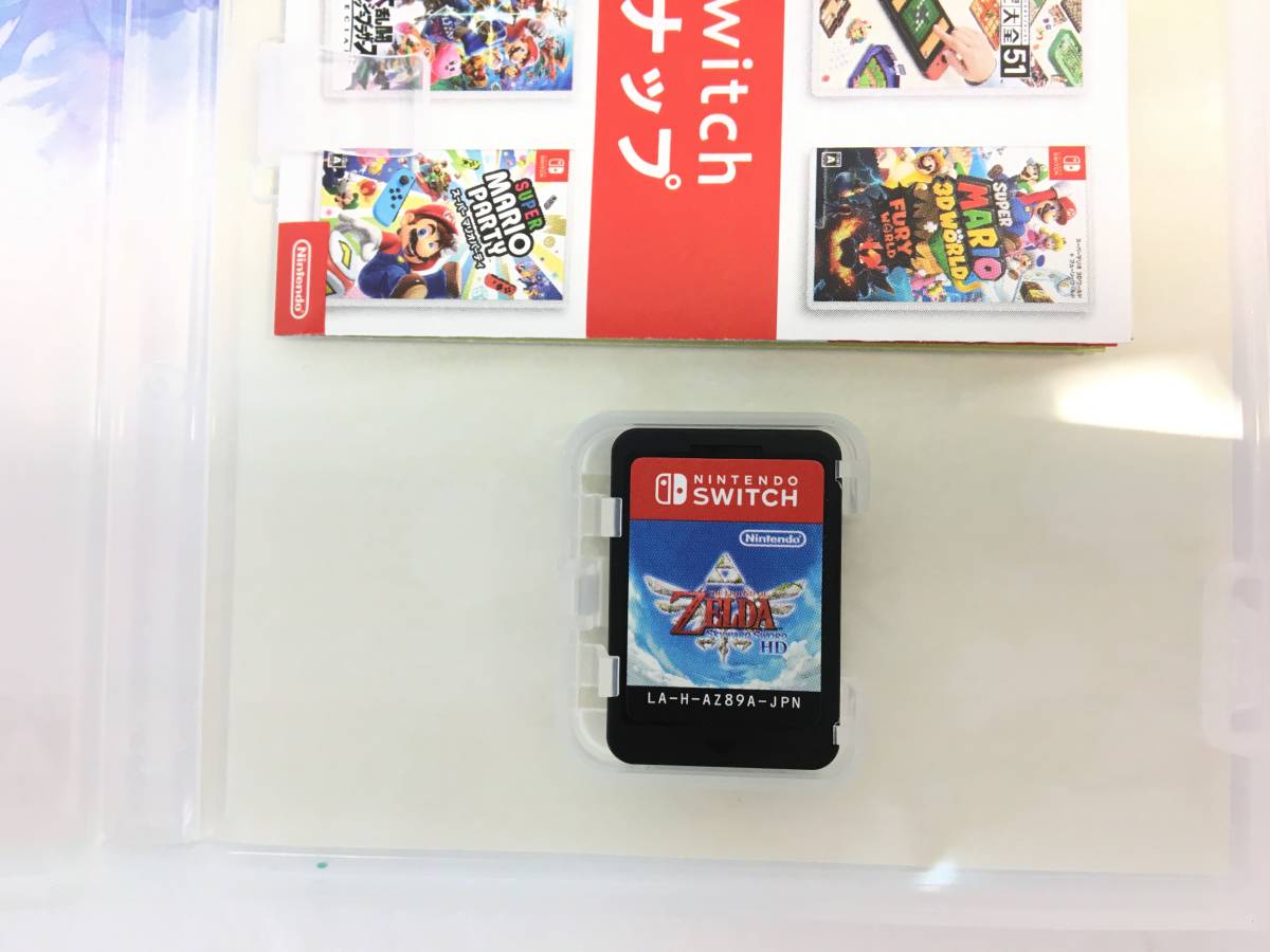 switchとソフト2本(ポケモンソード、ゼルダの伝説)