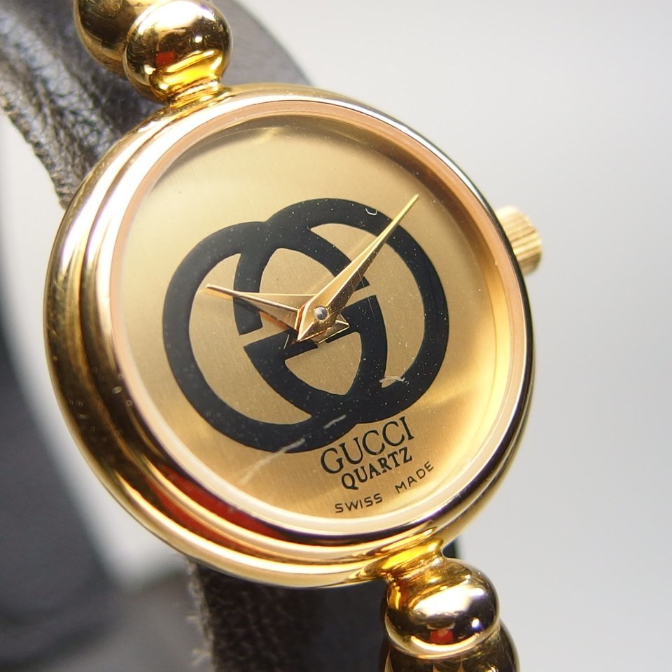 GUCCI/グッチ 2047.1L バングルウォッチ 黒文字盤 GGロゴ ゴールド