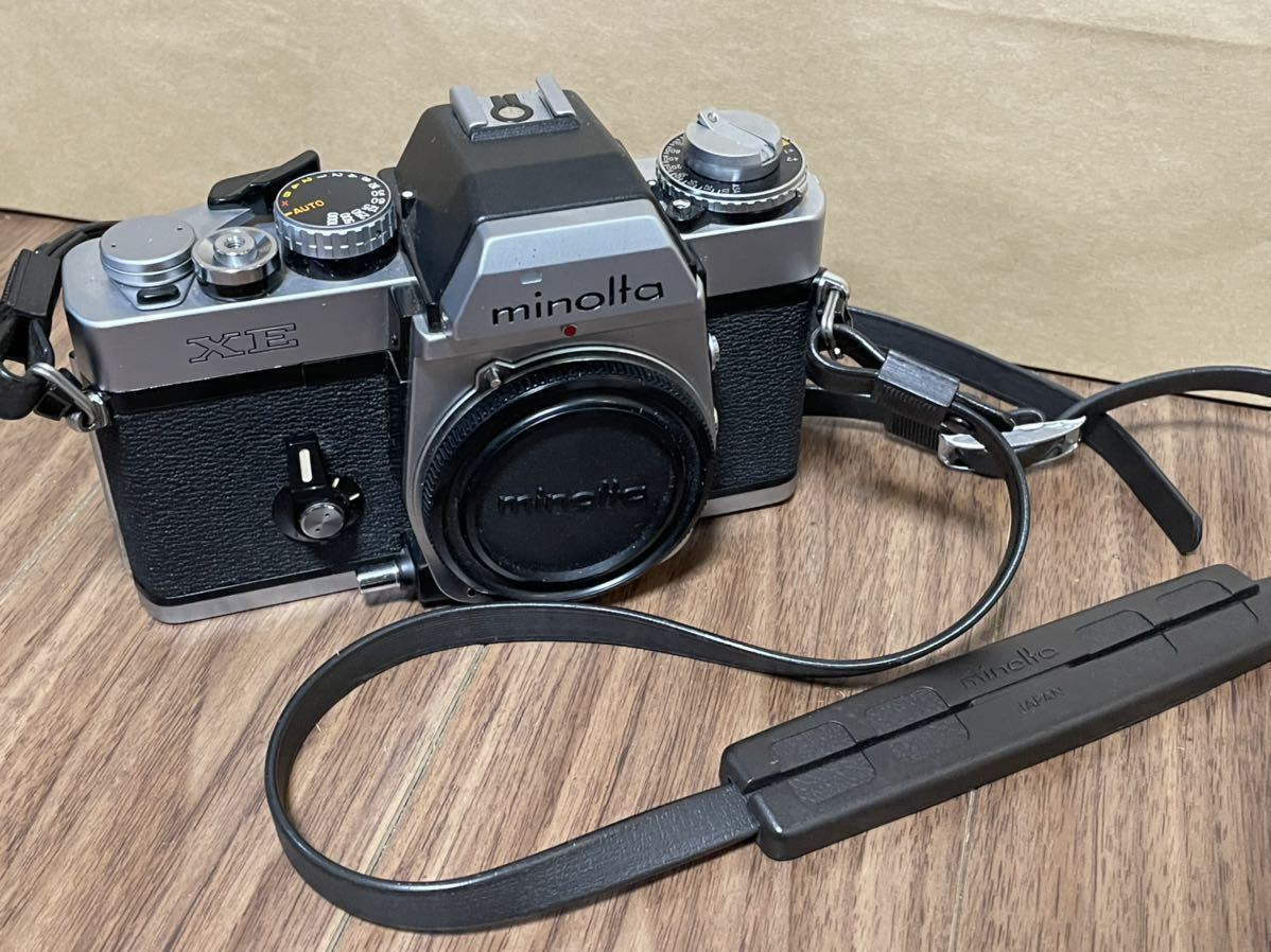 Minolta XE ミノルタ フィルム 一眼レフカメラ ストラップ付き 安心の定価販売 MINOLTA XE 一眼レフカメラ ボディ 純正ストラップ付き