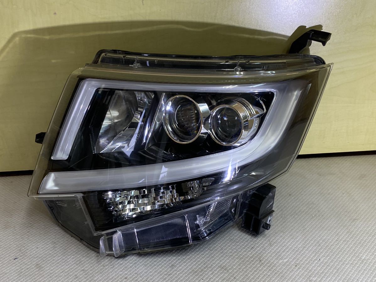 LA150Sムーヴカスタム 左ヘッドライト Koito 100-69010 LED#3662